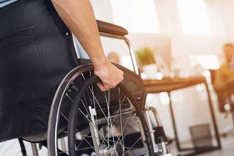 Injured man in wheelchair